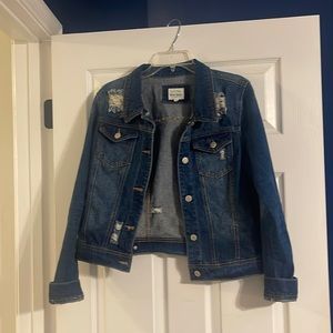 Distressed denim jacket